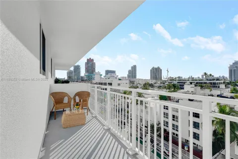 a view of a living room and dining room