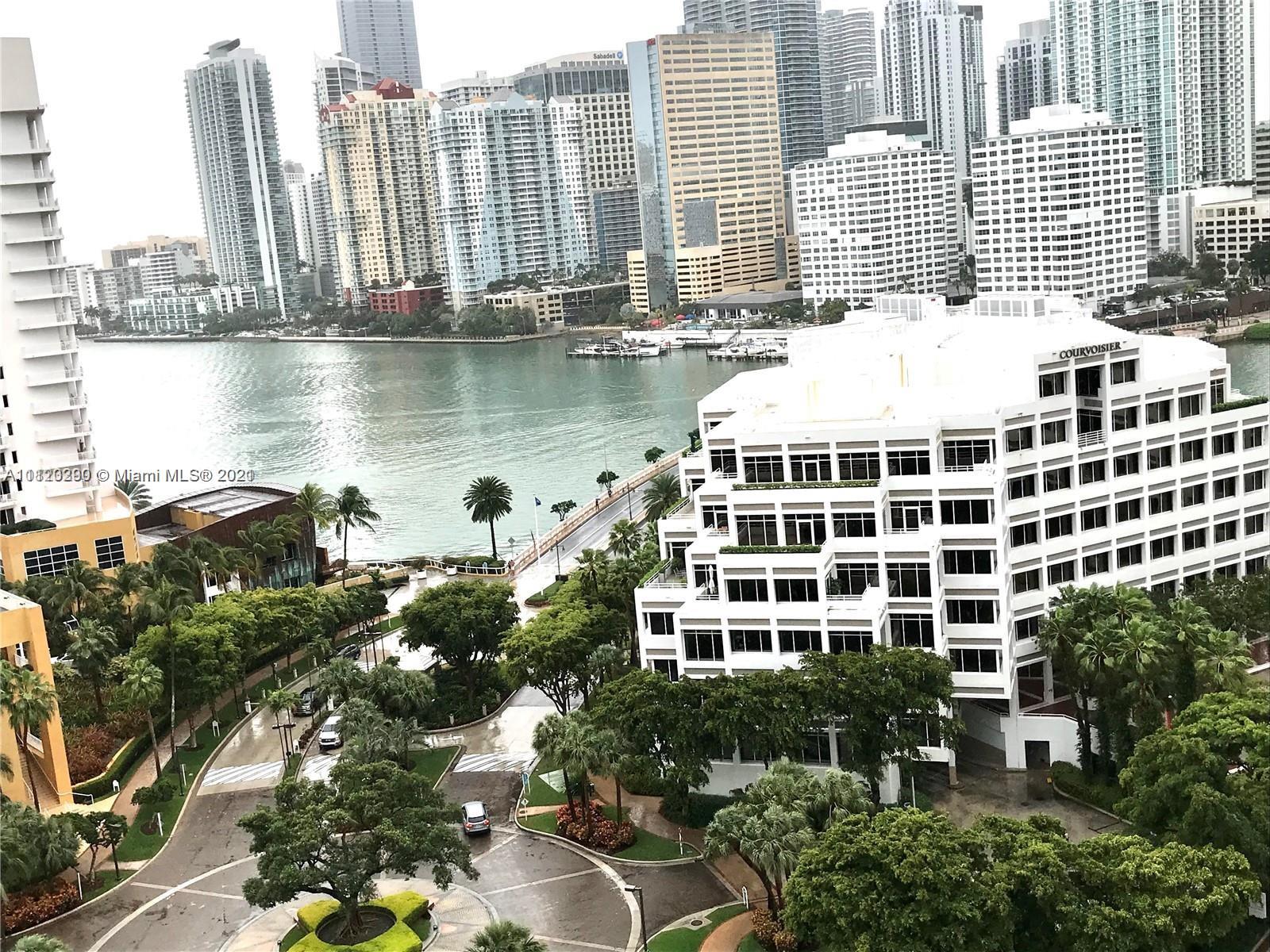 a view of a large building with a lake view