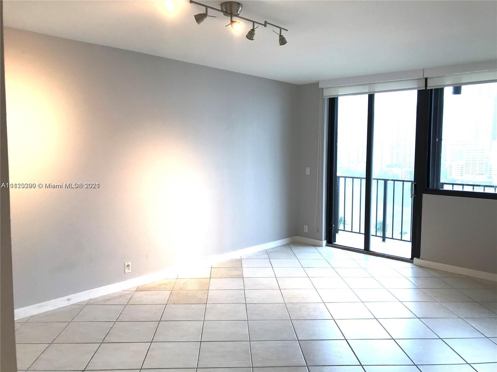 520 Brickell Key Drive, Unit A1717 Miami, FL 33131 - Photo 2 of 6 a view of an empty room and window