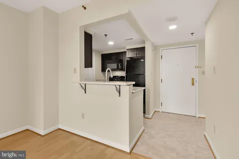 a view of a kitchen with a sink