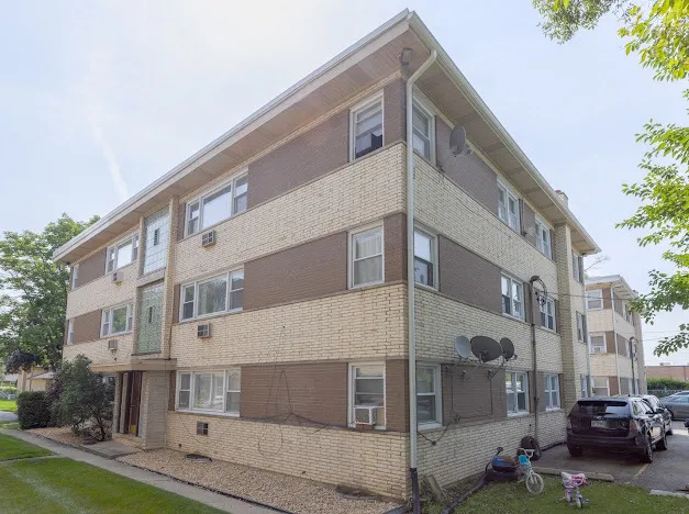 a view of a building with a street