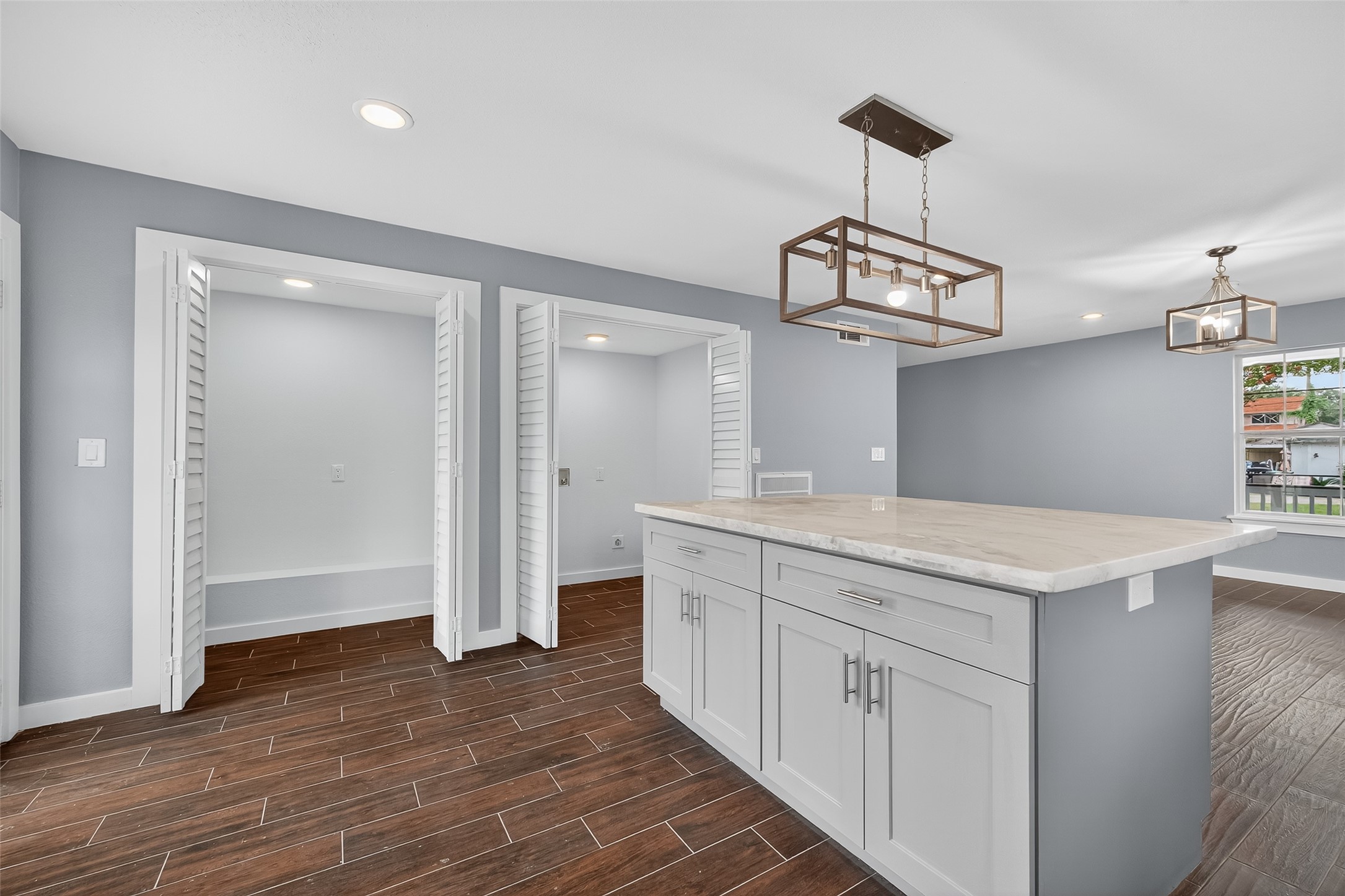 1933 Santa Rosa Street Houston, TX 77023 - Photo 22 of 44 a bathroom with a sink a mirror and a shower