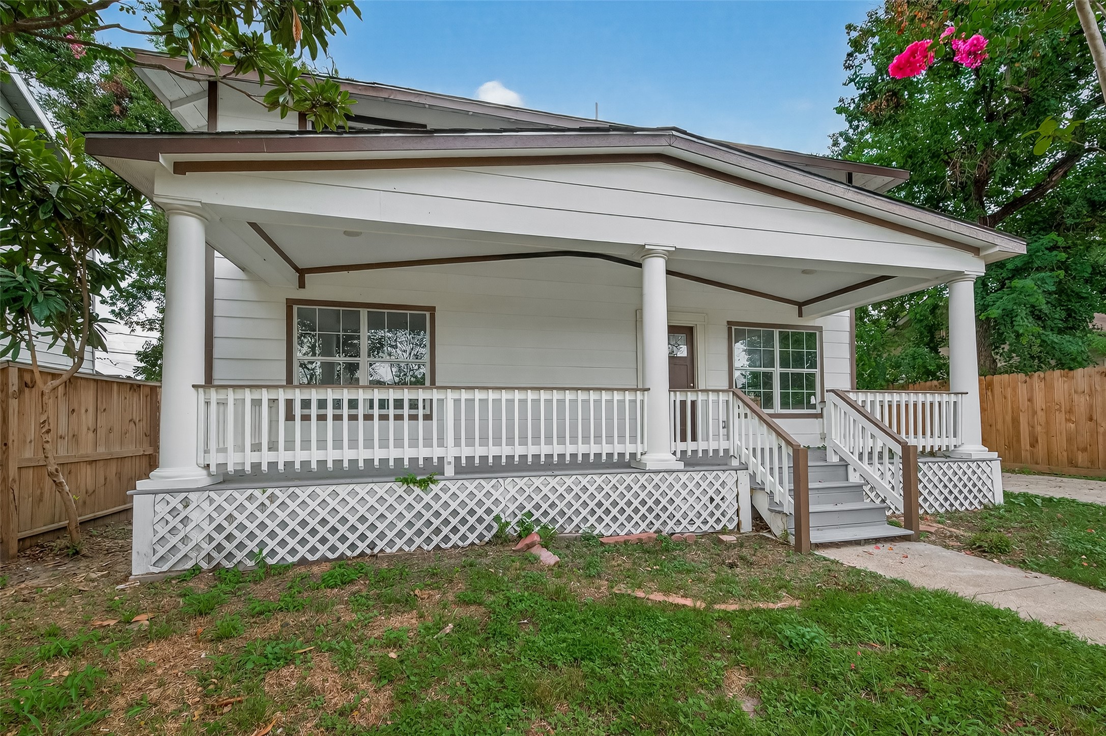 1933 Santa Rosa Street Houston, TX 77023 - Photo 3 of 44 a view of a house with a small yard
