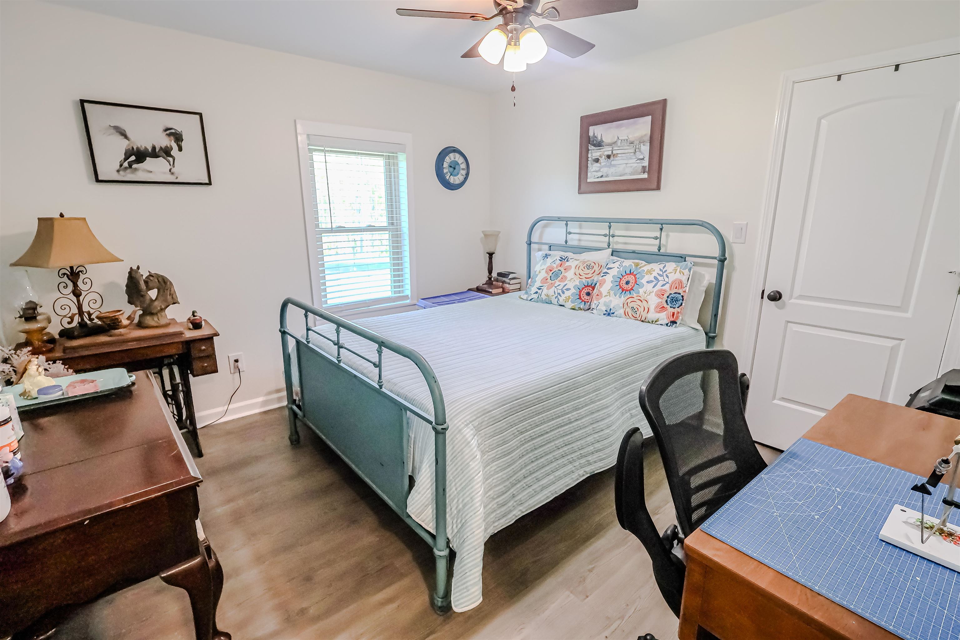 6264 Asbury Glimp Road Ripley, TN 38063 - Photo 8 of 18 Bedroom with baseboards, a ceiling fan, and wood finished floors