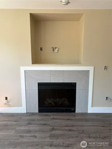 a living room with a fireplace