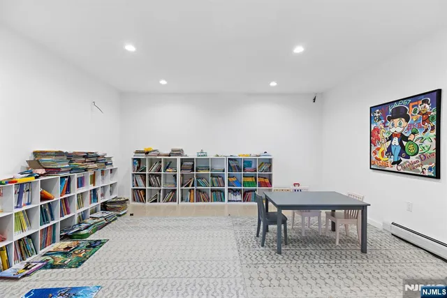 a workspace with furniture and book shelf