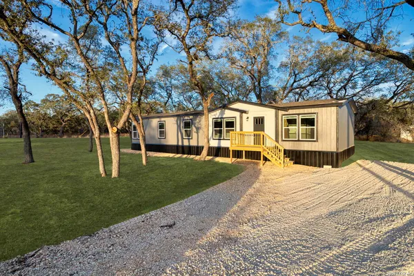 a view of a yard in front of house