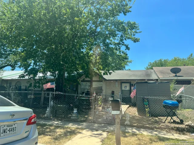 a view of a house with a yard balcony