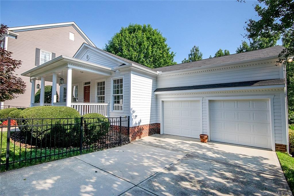 644 Bracket Street, Unit 513 Fort Mill, SC 29708 - Photo 18 of 19 a view of a house with a yard