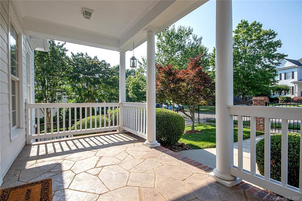 644 Bracket Street, Unit 513 Fort Mill, SC 29708 - Photo 3 of 19 a view of a porch with a yard