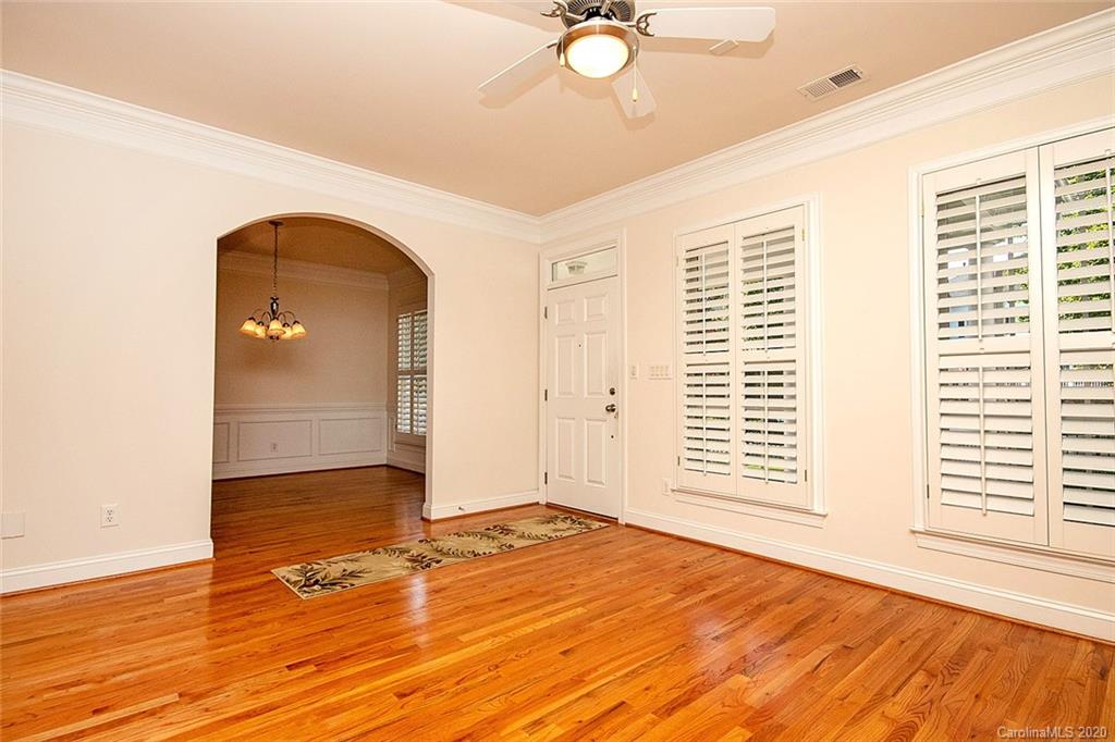 644 Bracket Street, Unit 513 Fort Mill, SC 29708 - Photo 8 of 19 a view of empty room with wooden floor and fan
