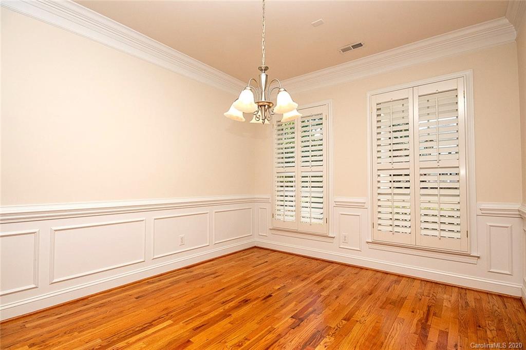 644 Bracket Street, Unit 513 Fort Mill, SC 29708 - Photo 9 of 19 a view of empty room with wooden floor and fan