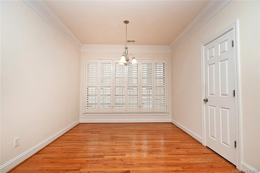 644 Bracket Street, Unit 513 Fort Mill, SC 29708 - Photo 10 of 19 wooden floor in an empty room with a window