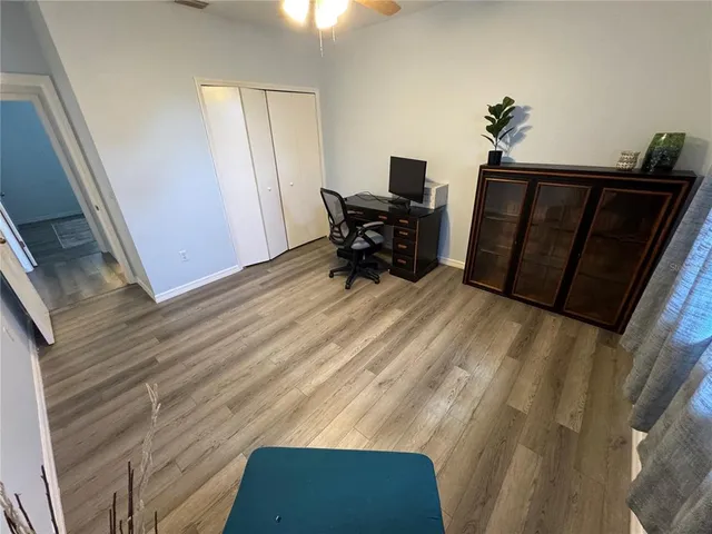 a view of livingroom with furniture and piano