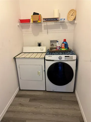 a utility room with dryer and washer