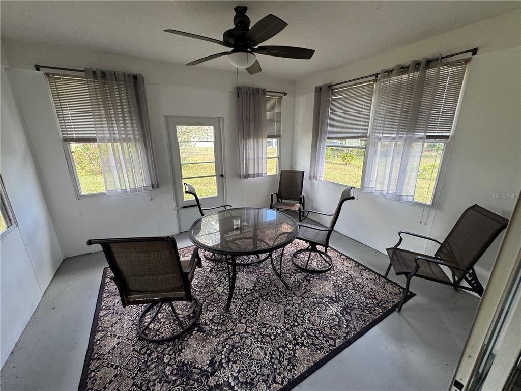 2466 Logsdon Street North Port, FL 34287 - Photo 18 of 18 a living room with furniture and a window