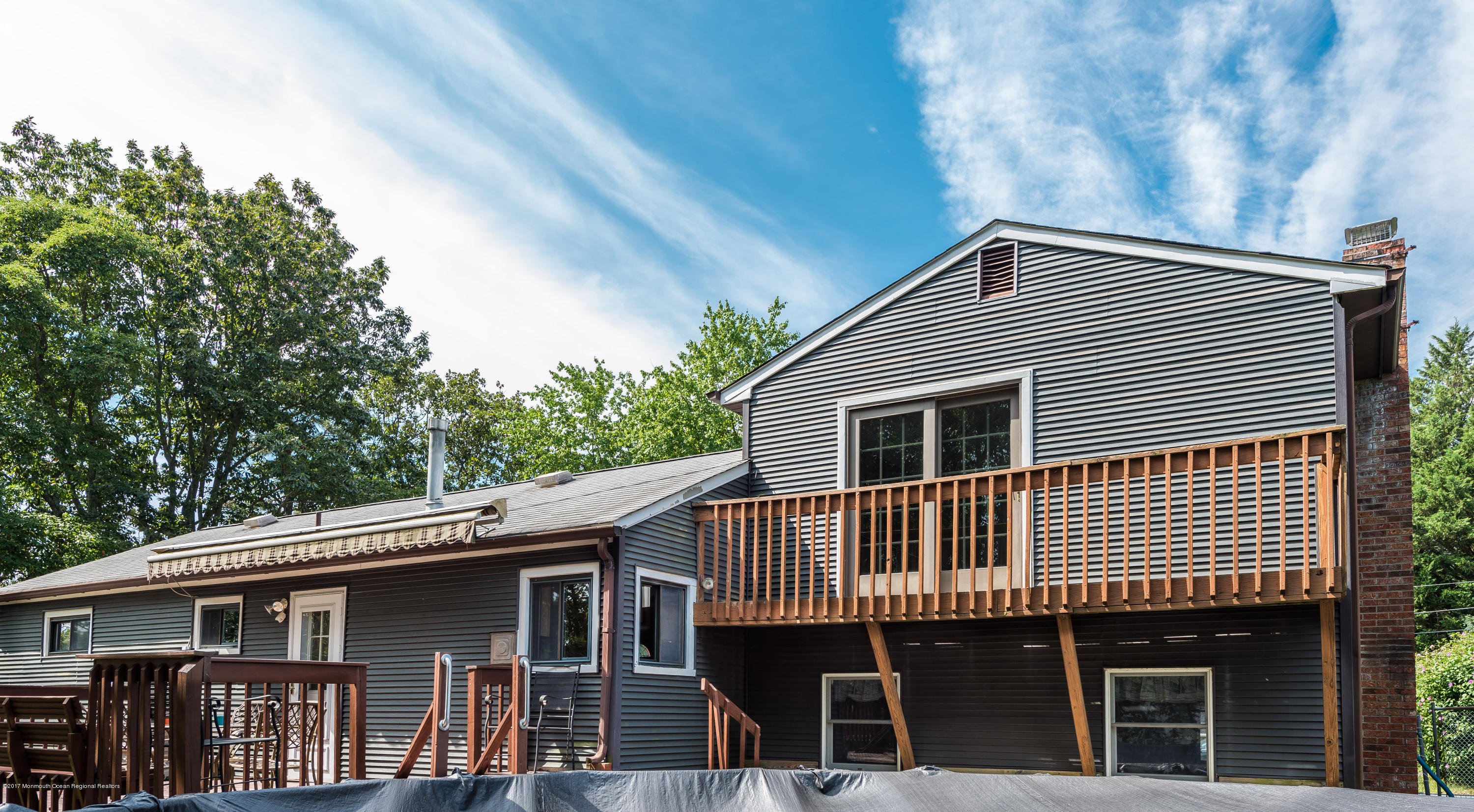 4 Hemlock Road Howell, NJ 07731 - Photo 13 of 15 a front view of a house with balcony