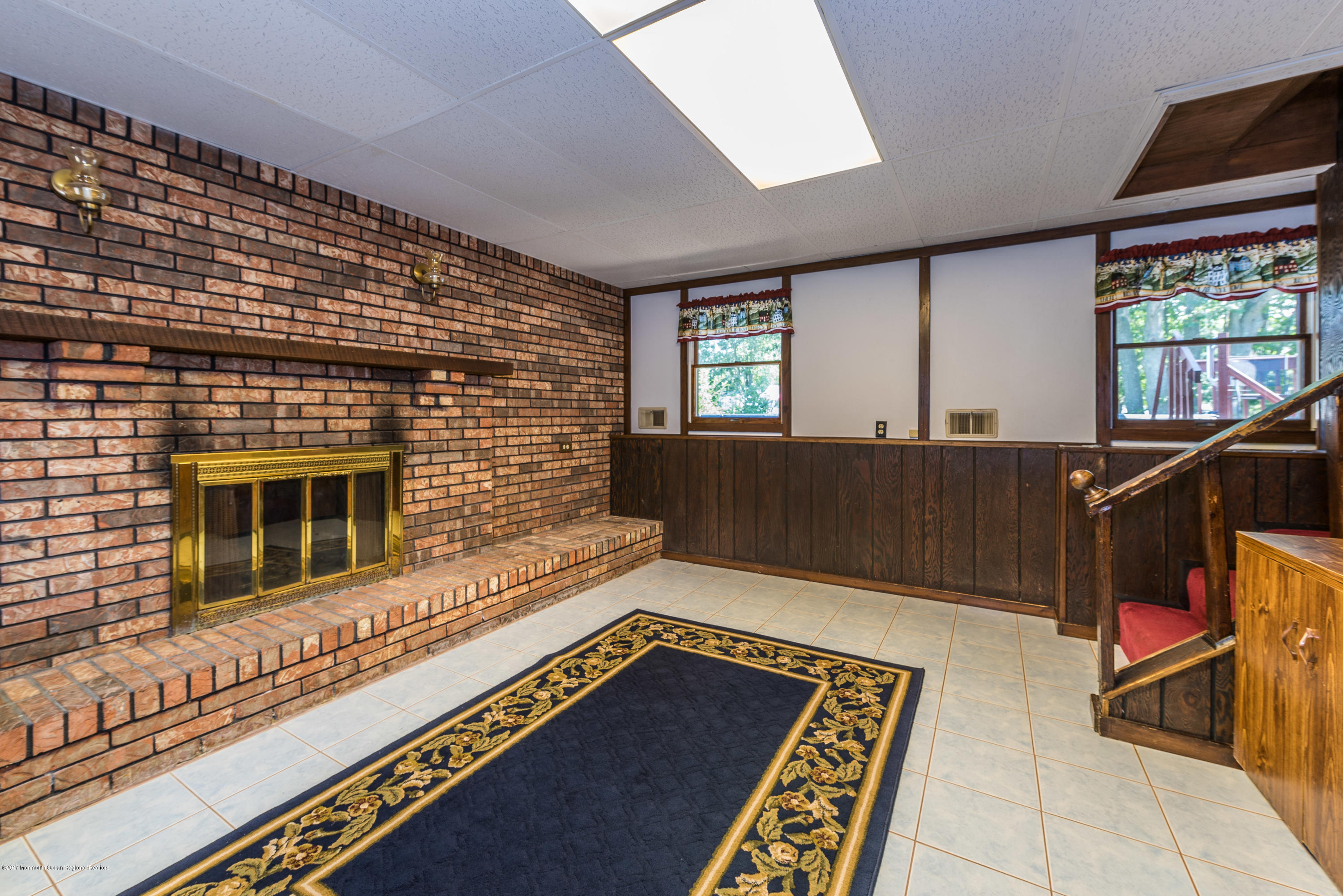 4 Hemlock Road Howell, NJ 07731 - Photo 3 of 15 a view of an empty room with wooden floor and a window