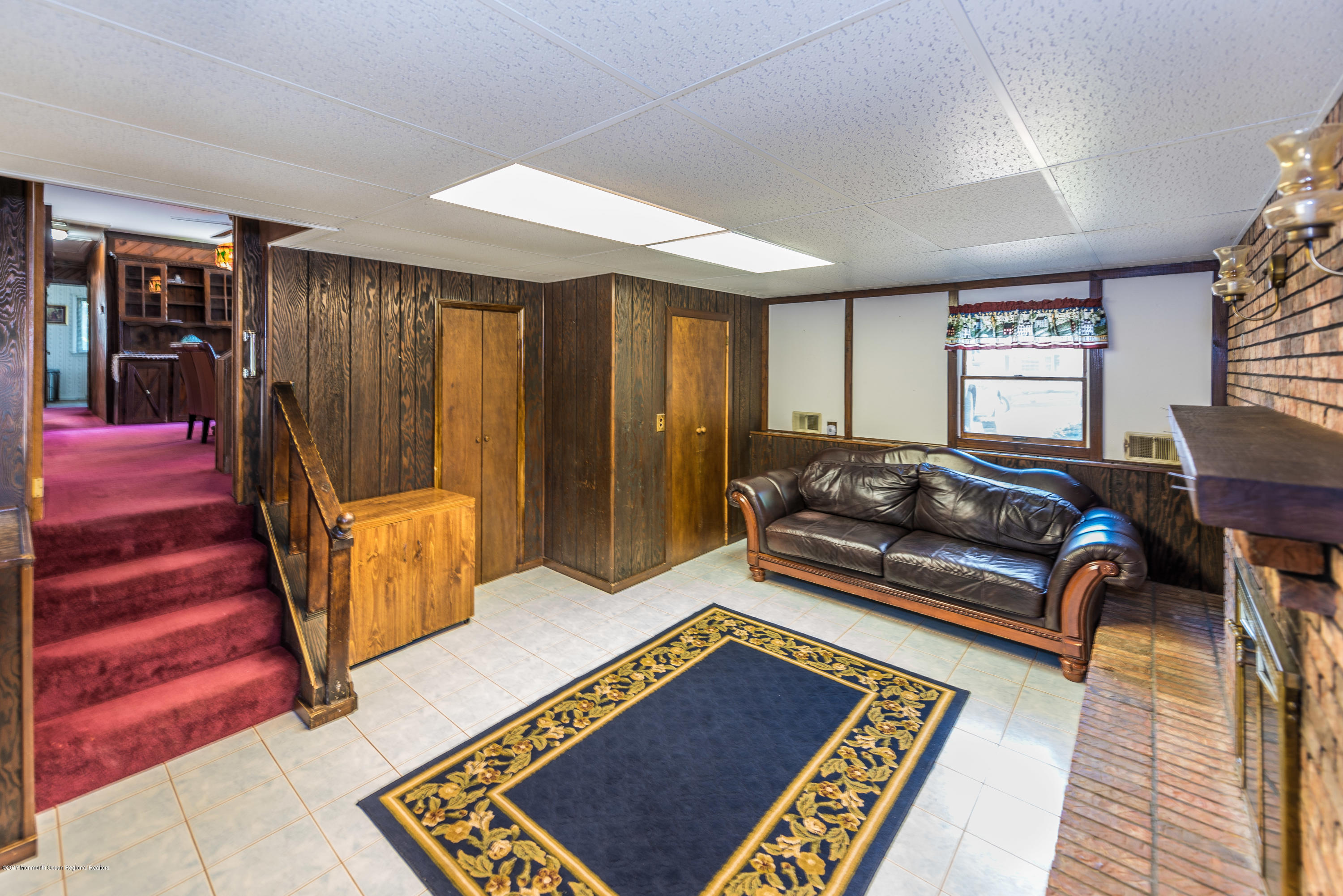 4 Hemlock Road Howell, NJ 07731 - Photo 6 of 15 a living room with furniture rug and wooden floor