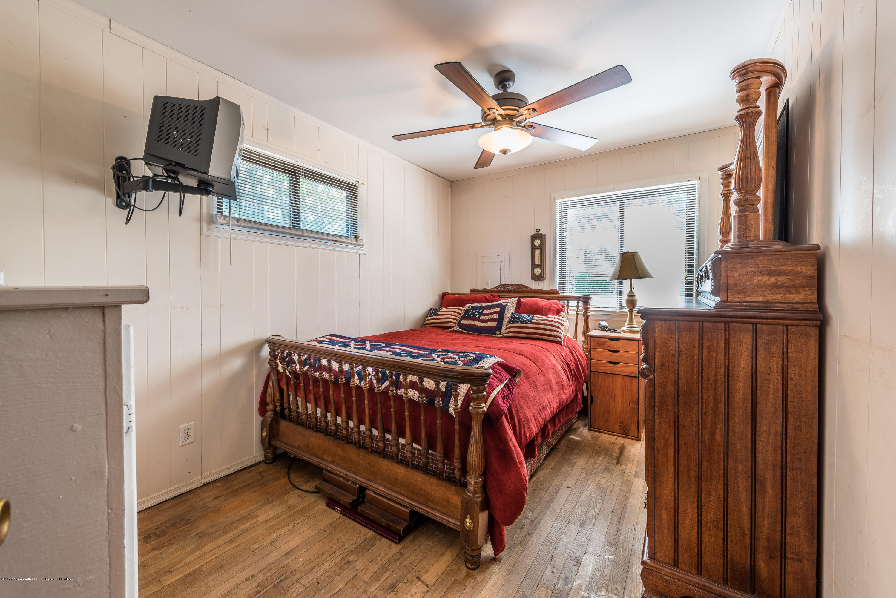 4 Hemlock Road Howell, NJ 07731 - Photo 9 of 15 a bedroom with a bed and wooden floor