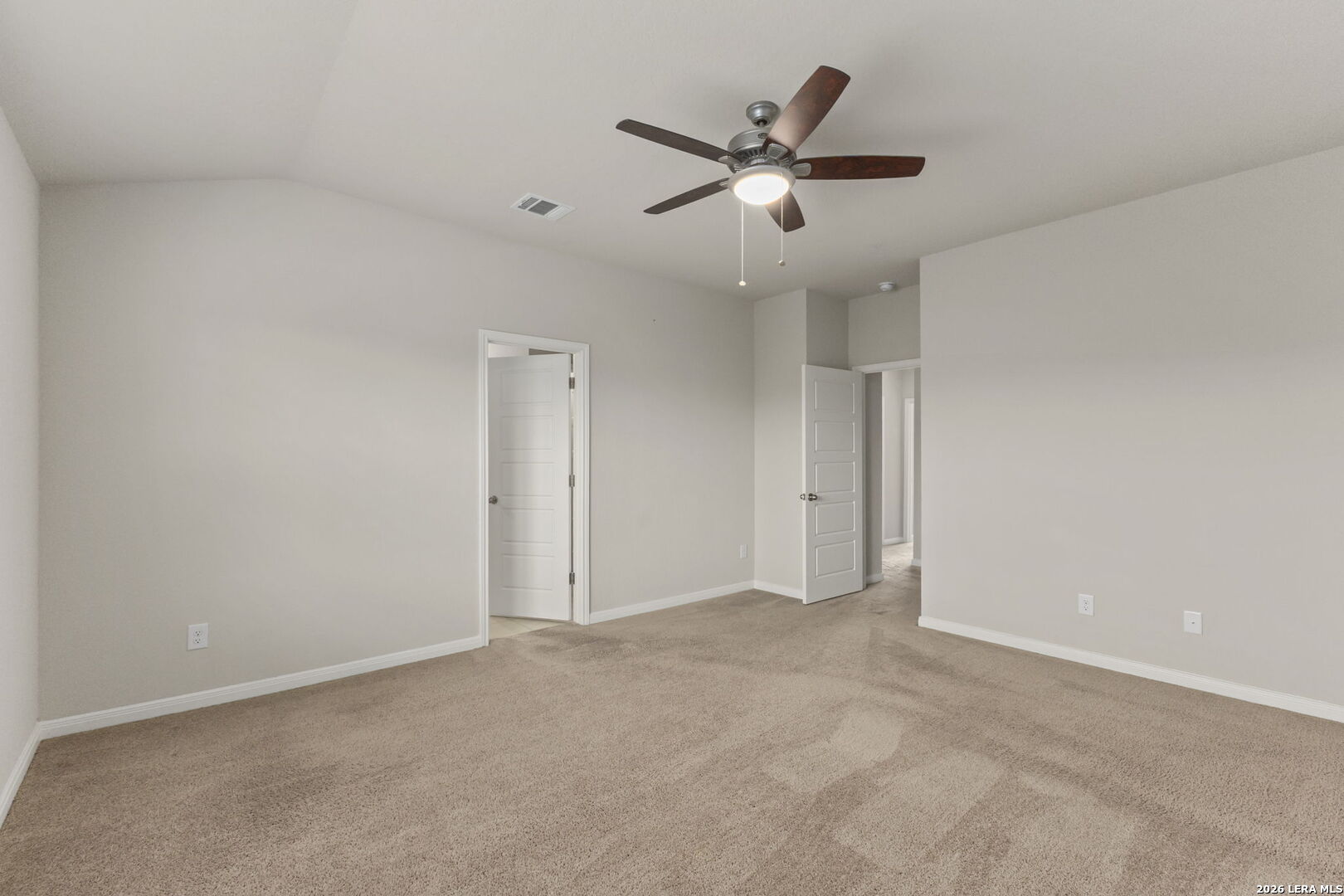 12221 Icon Ridge San Antonio, TX 78253 - Photo 22 of 46 an empty room with a ceiling fan and a window