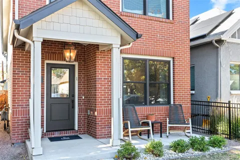 a front view of a house with a porch