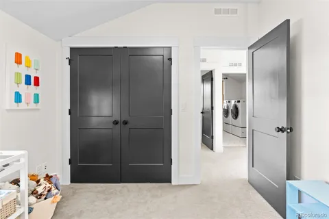 wooden floor and closet in a room