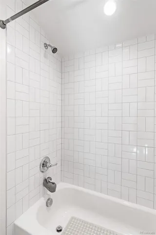 a bathroom with a sink and a bathtub