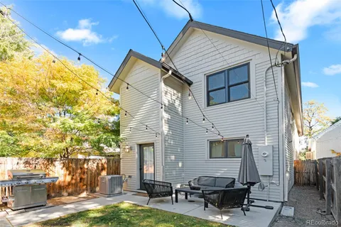 a backyard of a house with seating space