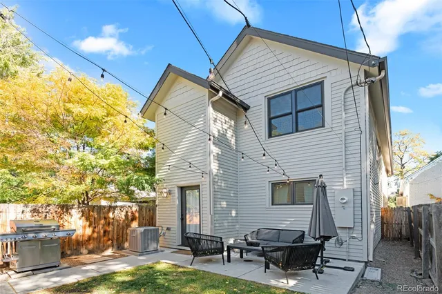 a backyard of a house with seating space