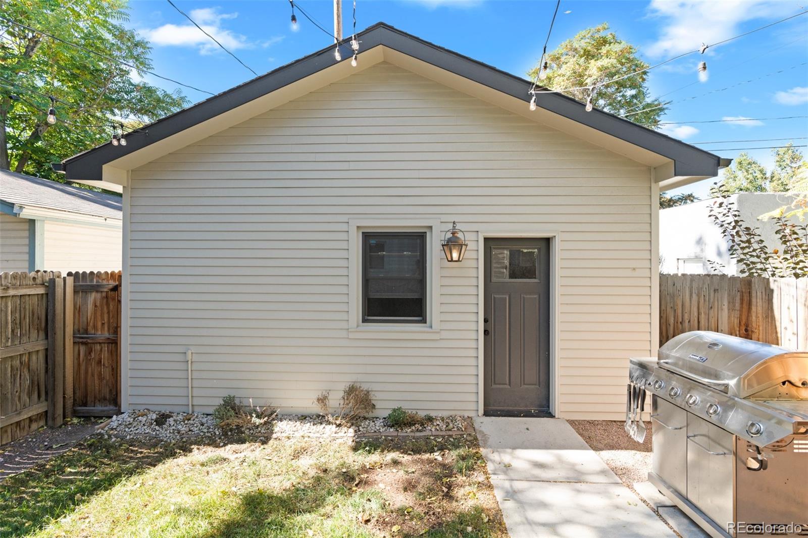 333 Delaware Street Denver, CO 80223 - Photo 43 of 44 a backyard of a house
