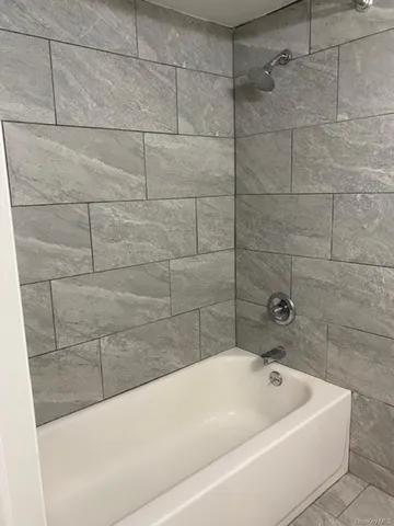 a bathroom with a bathtub