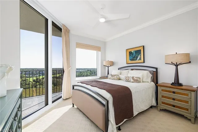 a bedroom with a bed and a night stand