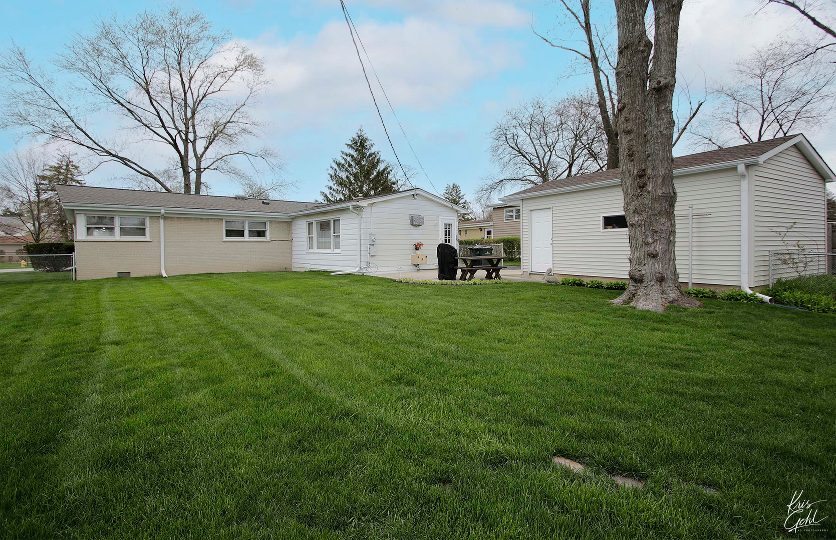 514 Warren Road Glenview, IL 60025 - Photo 19 of 21 a view of a house with a yard