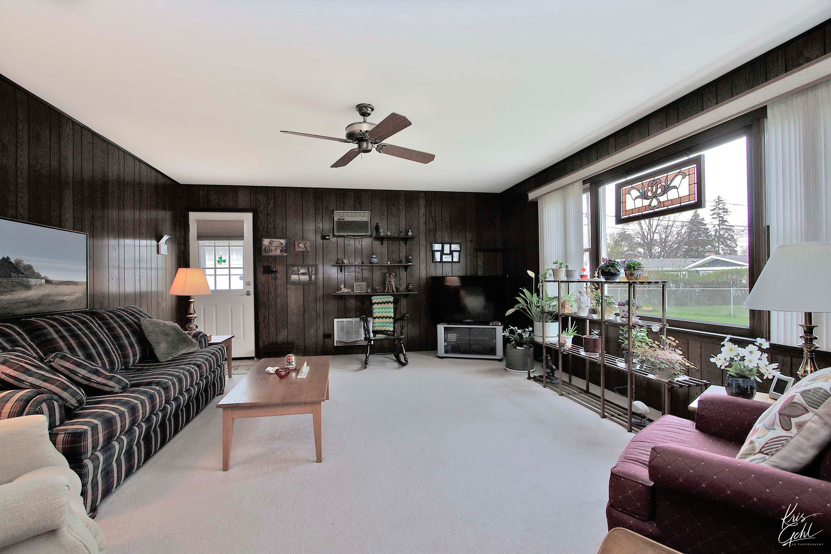 514 Warren Road Glenview, IL 60025 - Photo 9 of 21 a living room with furniture and a large window