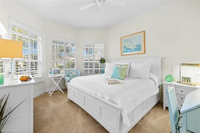 a bed room with a bed and a table