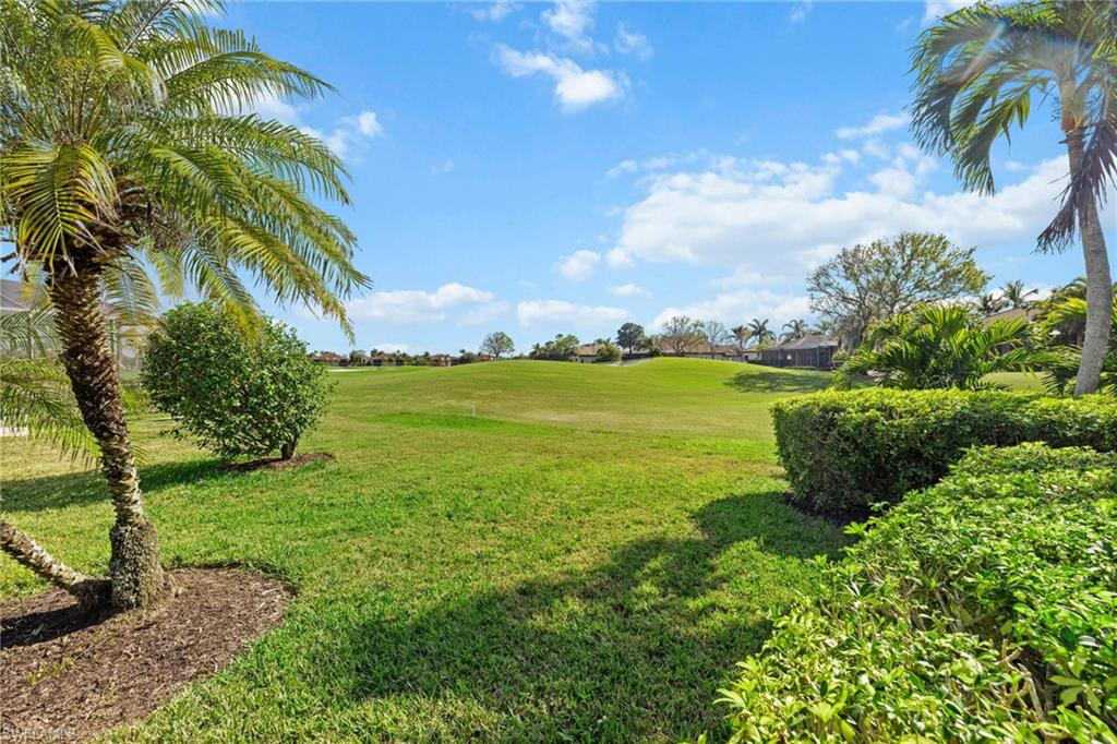 6737 Bent Grass Drive Naples, FL 34113 - Photo 20 of 31 a view of an ocean from a building