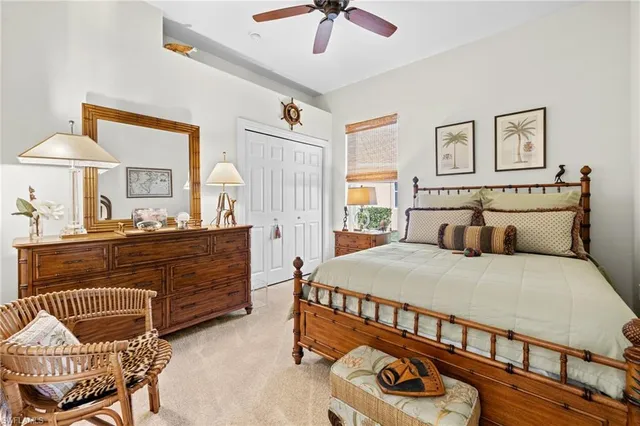 a bedroom with bed and window