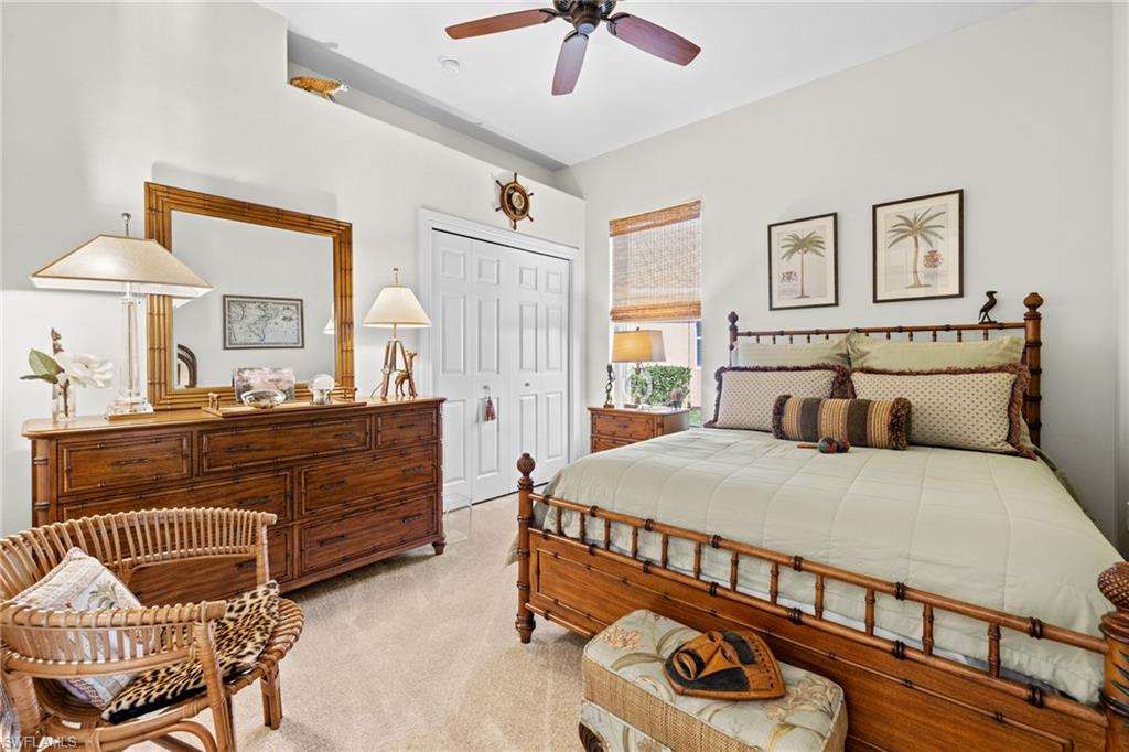 6737 Bent Grass Drive Naples, FL 34113 - Photo 25 of 31 a bedroom with bed and window
