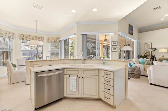 a kitchen with cabinets and sink