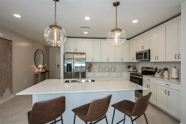 $349,990 | 257 Moonlit Lk Trail, Lehigh Acres, FL 33974