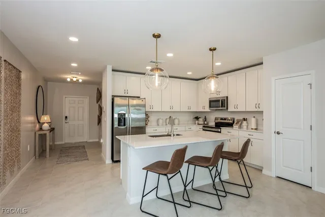 $349,990 | 257 Moonlit Lk Trail, Lehigh Acres, FL 33974