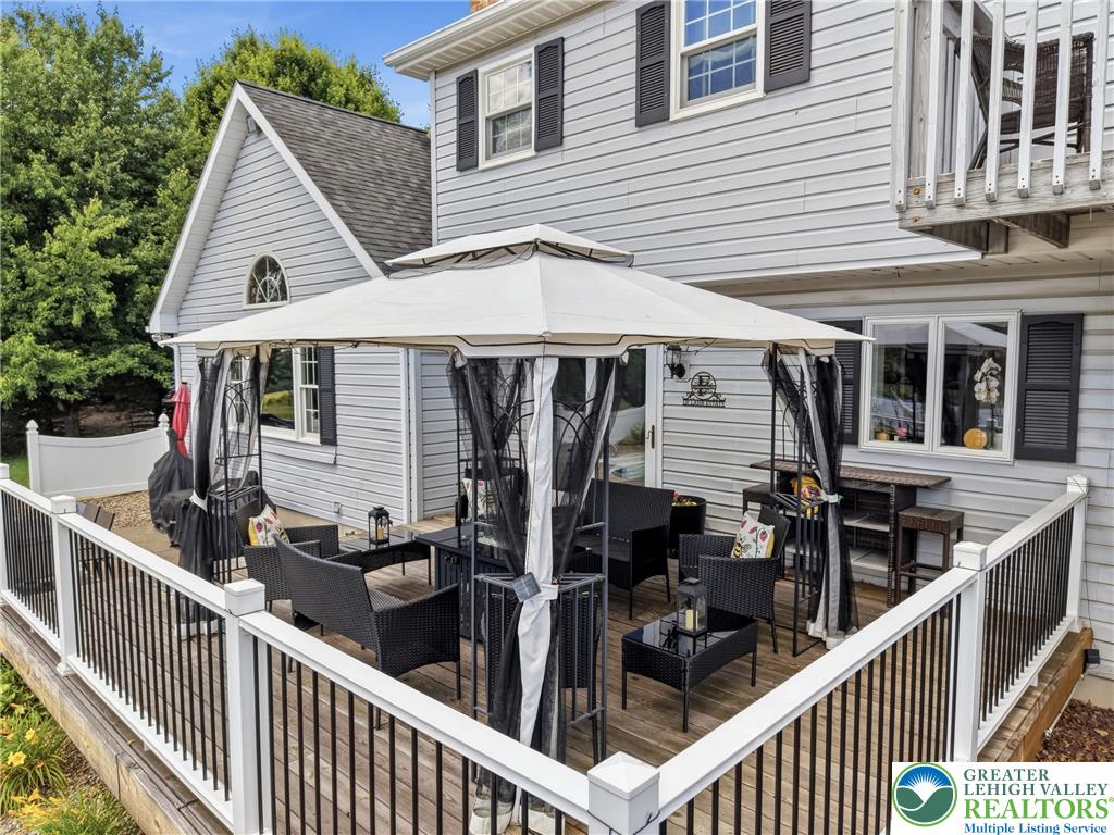 890 Lahr Road Nazareth, PA 18064 - Photo 55 of 71 An inviting deck with a canopy provides ample outdoor entertaining space.