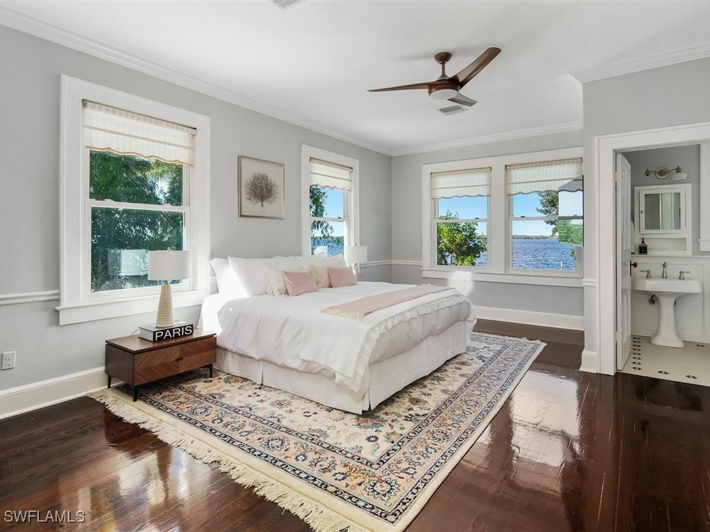 101 Fairview Avenue Fort Myers, FL 33905 - Photo 16 of 34 a bedroom with a large bed and a window