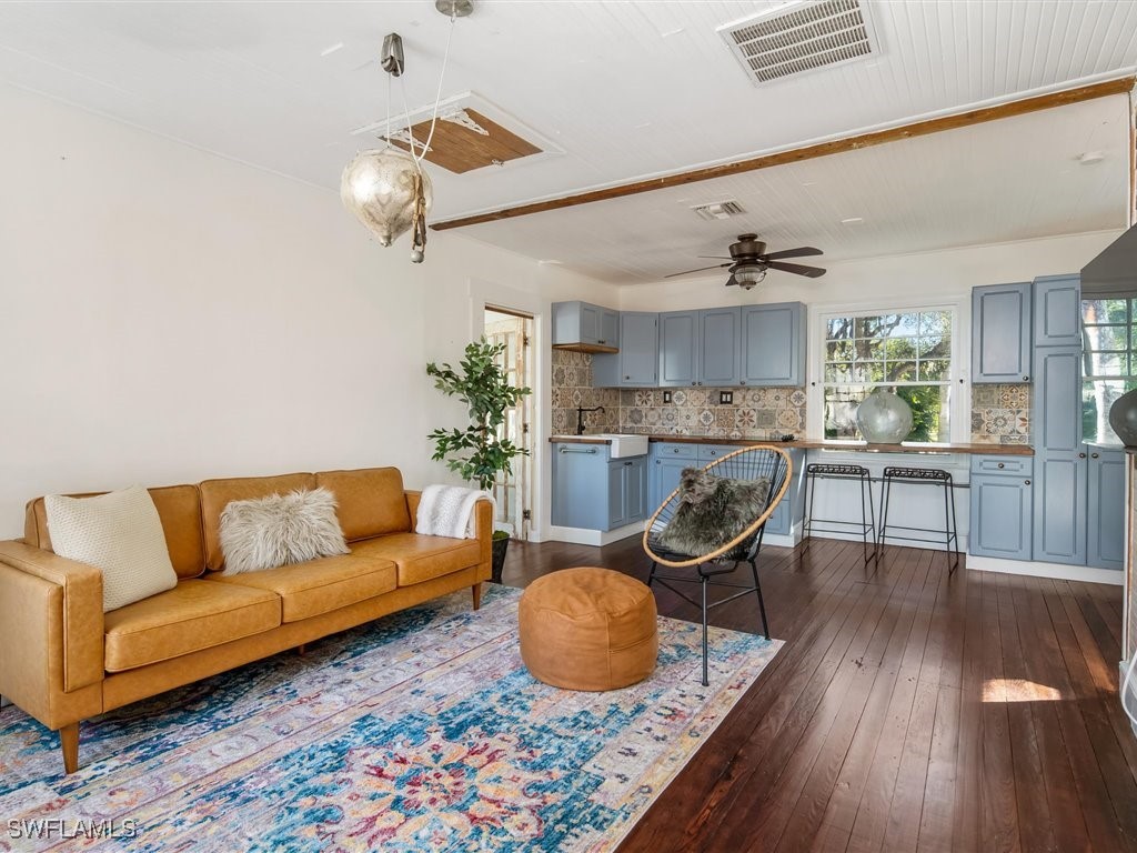 101 Fairview Avenue Fort Myers, FL 33905 - Photo 24 of 34 a living room with furniture and kitchen view