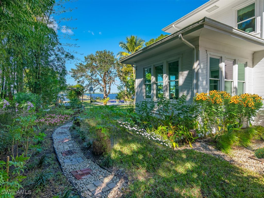 101 Fairview Avenue Fort Myers, FL 33905 - Photo 5 of 34 front view of a house with a yard