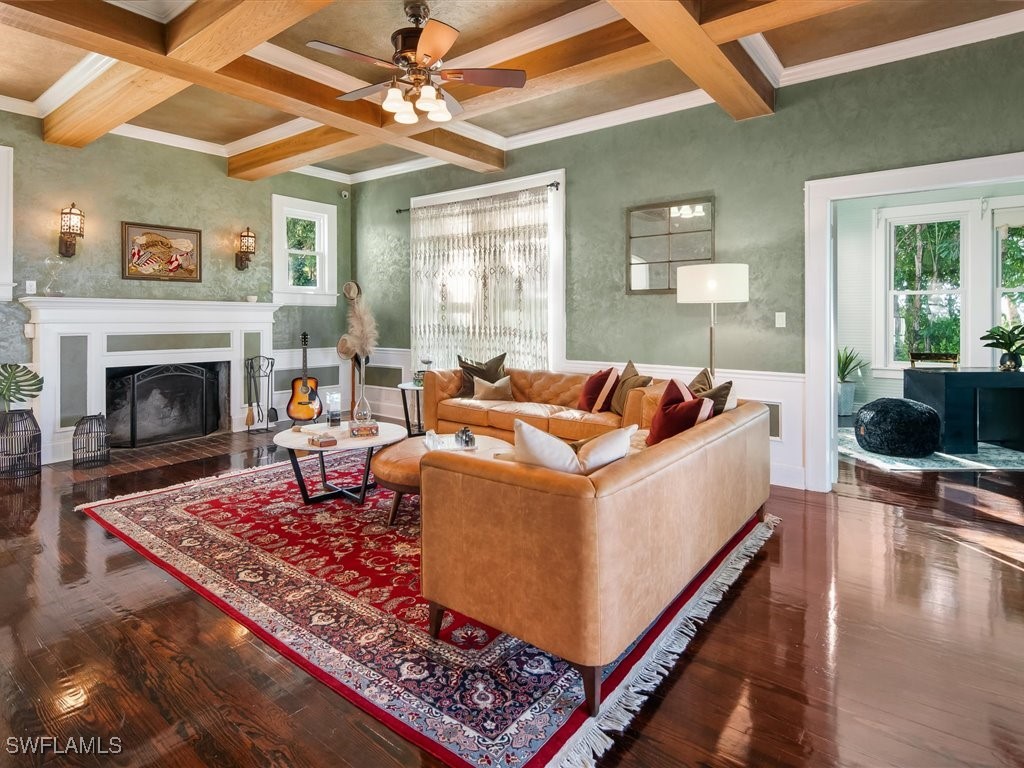 101 Fairview Avenue Fort Myers, FL 33905 - Photo 7 of 34 a living room with furniture and a fireplace