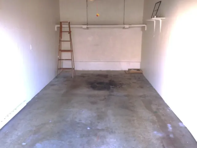 a view of a house with backyard patio and swimming pool