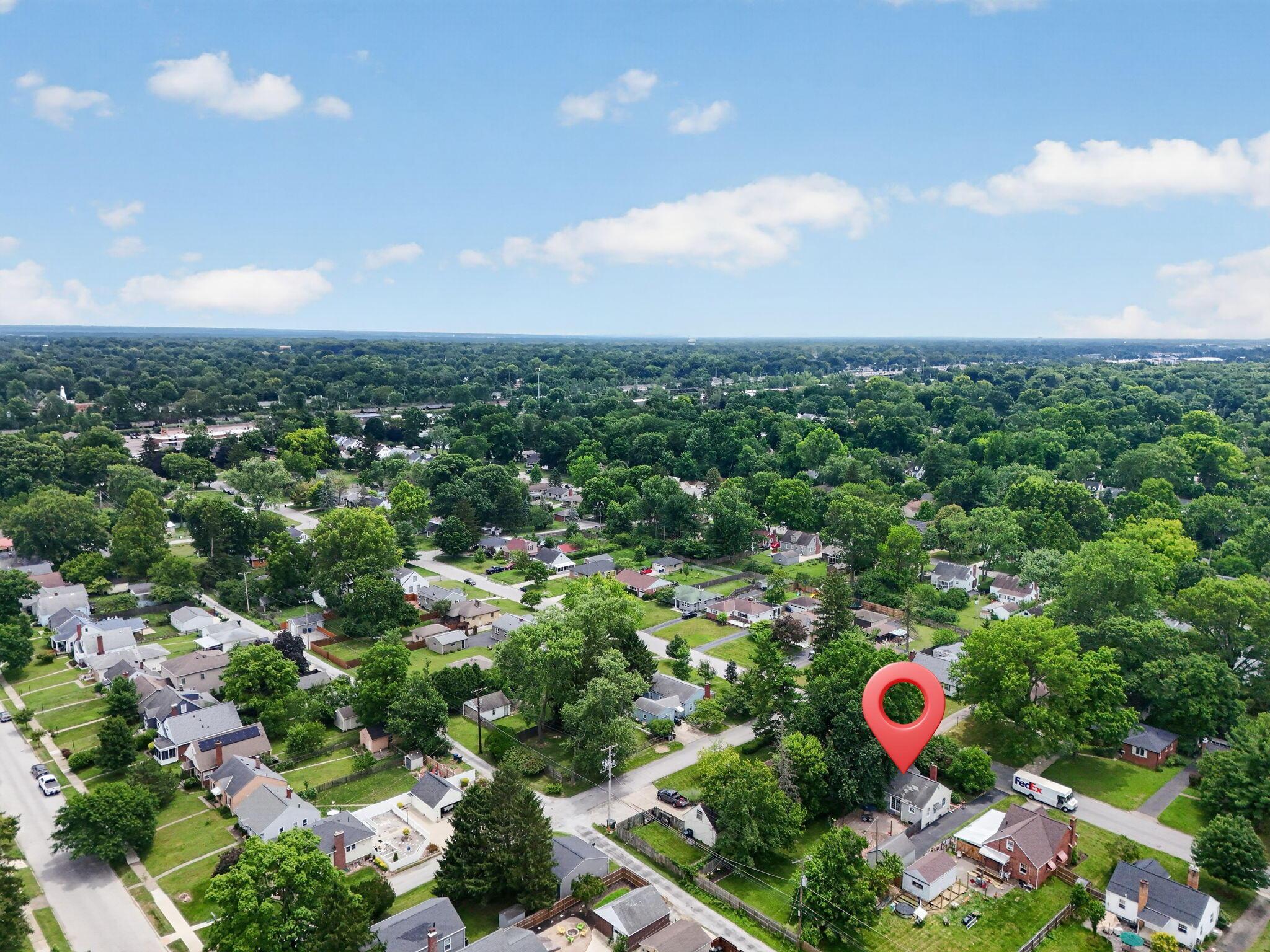 492 Wetmore Road Columbus, OH 43214 - Photo 54 of 55 Aerial perspective showcasing a residential neighborhood with abundant mature trees and established homes