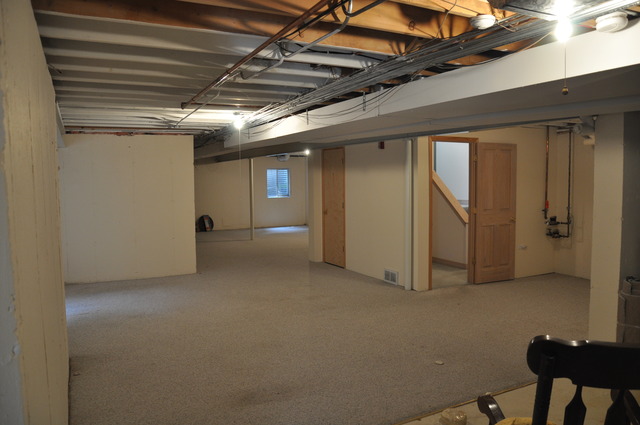 1905 Plainfield Road, Unit C Downers Grove, IL 60516 - Photo 17 of 20 a view of a room with wooden walls